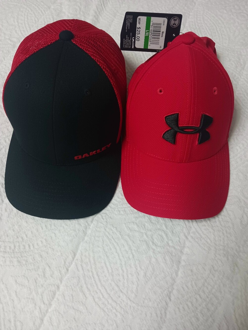 TWO HATS ONE OAKLEY  AND ONE UNDER ARMOUR  SZ-L/XL
